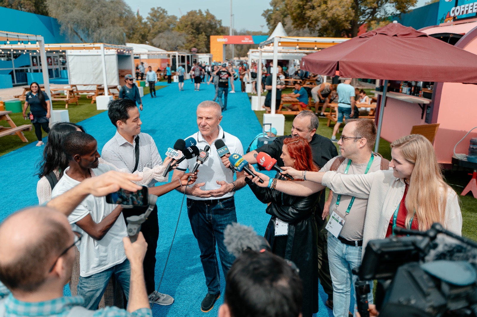 President Sergii Bubka welcomes athletes while visiting Welcome Ceremony venue and Accreditation center